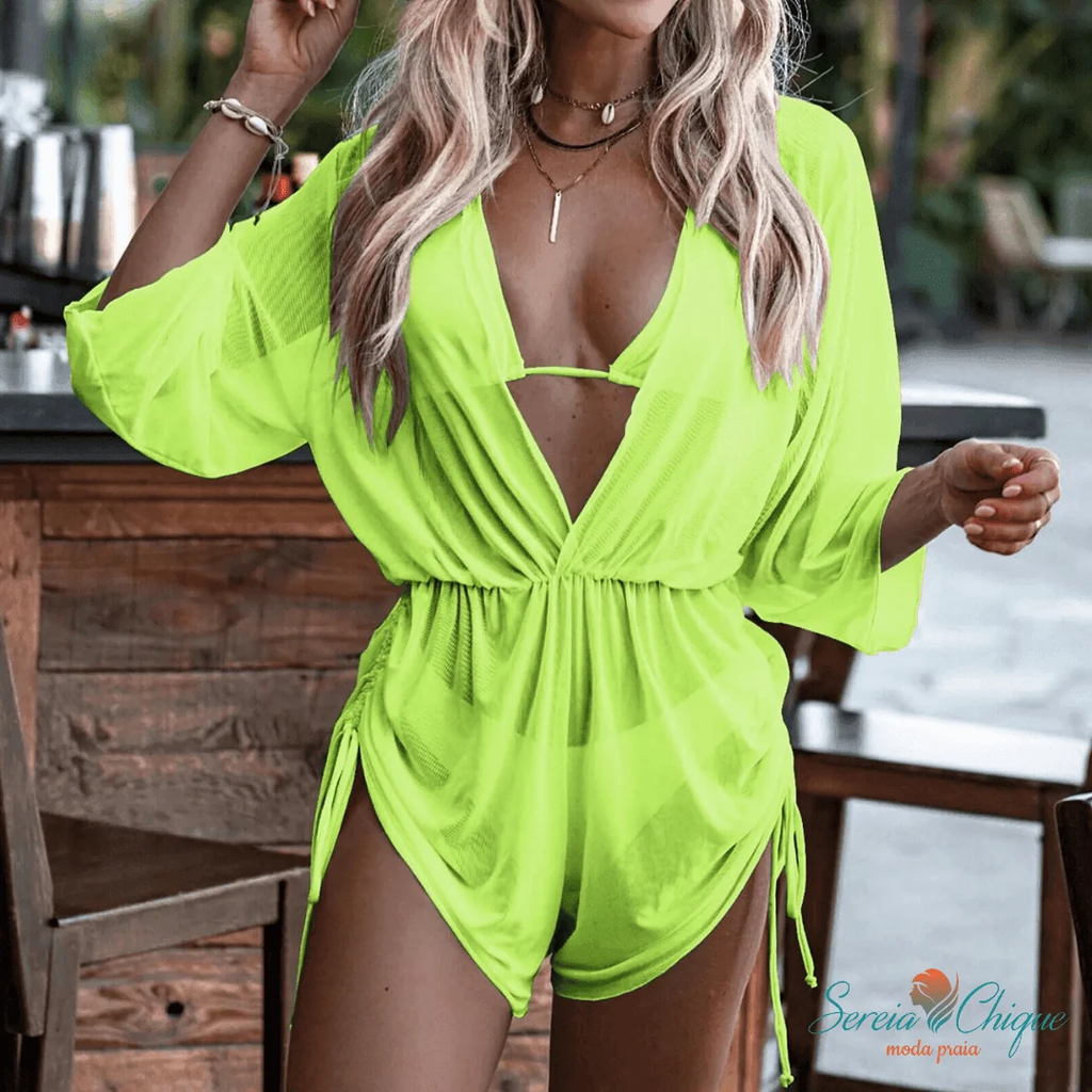 Green cover-up shown from the front over a matching bikini top